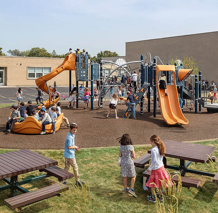 Hillel Torah students building social emotional learning skills while playing together on the school playground.